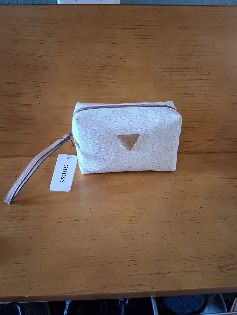 GUESS Cream Cosmetic Wristlet with Taupe Logo Trim